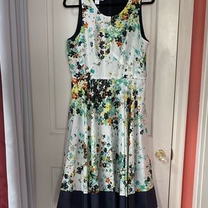 NWOT. Never worn beautiful fit and flare Donna Morgan dress. Sz 10